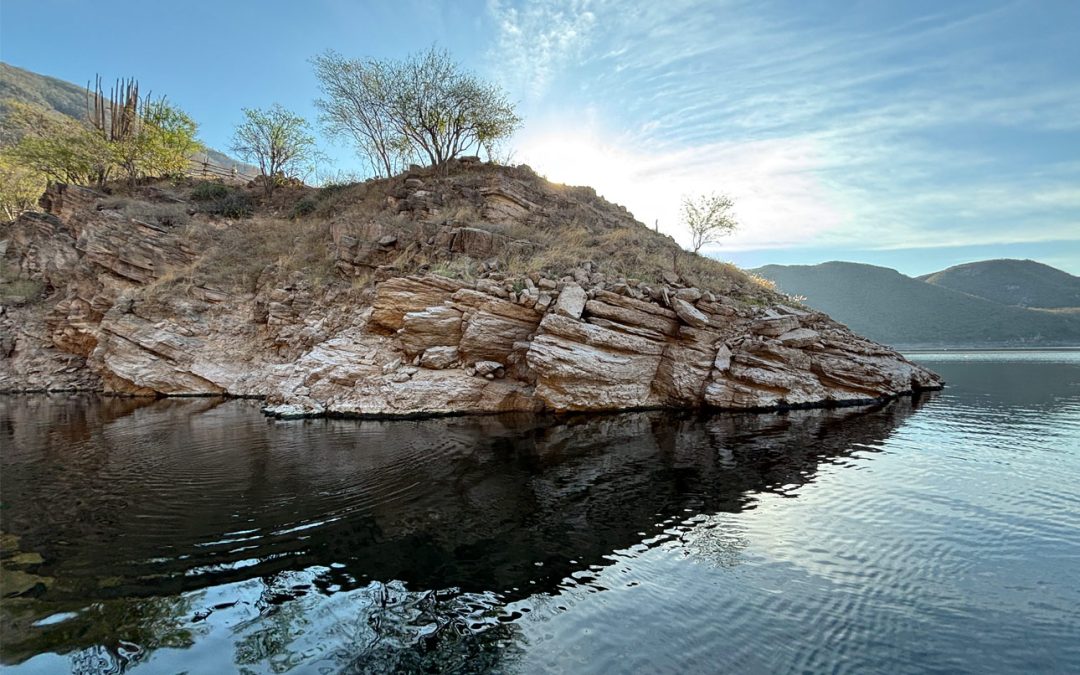 steep shaded rock wall on Lake Aguamilpa